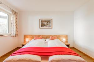 Een bed of bedden in een kamer bij Ferienwohnungen Barbara