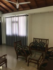 Posezení v ubytování Unawatuna Beach Bungalow -