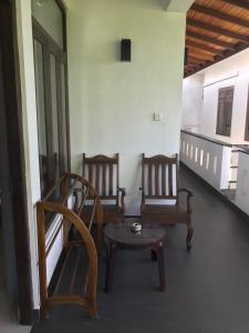 Posezení v ubytování Unawatuna Beach Bungalow -