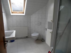 Koupelna v ubytování Landsitz Riekenshof in Horumersiel