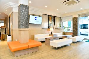 TV a/nebo společenská místnost v ubytování New Commander Hotel Osaka Neyagawa