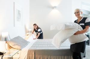Ein Bett oder Betten in einem Zimmer der Unterkunft Hotel Ristorante Sogno