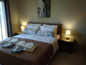 Posteľ alebo postele v izbe v ubytovaní Iris Deluxe Suites 1