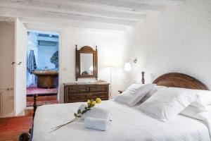 Cama o camas de una habitación en Els Caçadors de Maçanet