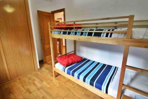 Łóżko lub łóżka w pokoju w obiekcie Casa de O Rosal