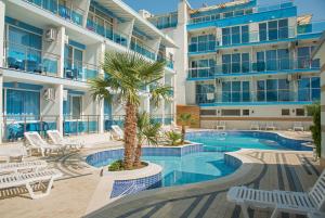 Bazén v ubytování Hotel Eskada Beach nebo v jeho okolí