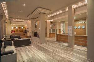 The lobby or reception area at Hotel Eskada Beach