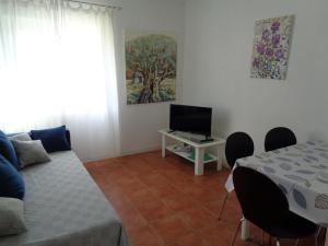 Et tv og/eller underholdning på Apartments Maslina