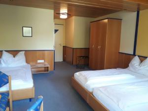 Postel nebo postele na pokoji v ubytování Gästehaus Stögmüller