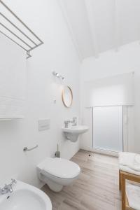 Koupelna v ubytování Insula Vinus Apartments + 21 fotografií