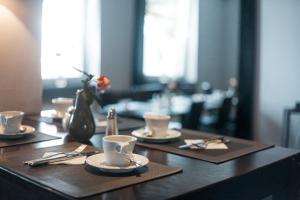 Restoran või mõni muu söögikoht majutusasutuses Hotel am Rothenbaum