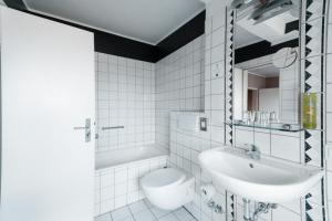 Vannituba majutusasutuses Hotel am Rothenbaum