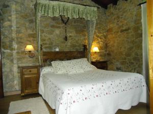 Postel nebo postele na pokoji v ubytování Posada Herrán