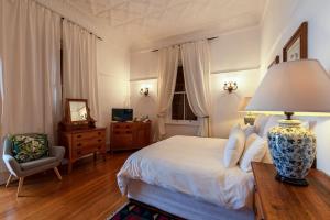 Katil atau katil-katil dalam bilik di Esperanza Guest House