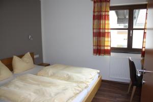 Posteľ alebo postele v izbe v ubytovaní Appartementhaus Bergblick