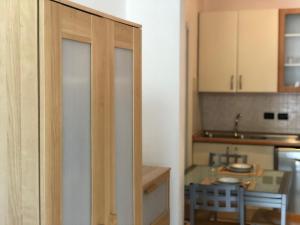 A kitchen or kitchenette at Pizzardi39 - The Place Apartments