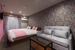 Letto o letti in una camera di Stay SAKURA Kyoto Shijo Karasuma