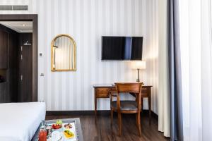 TV a/nebo společenská místnost v ubytování Intelier Palacio San Martin