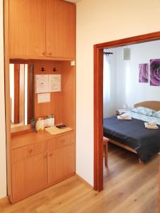 Postel nebo postele na pokoji v ubytování Apartment Carmen