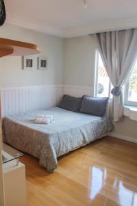 Ένα ή περισσότερα κρεβάτια σε δωμάτιο στο FamilyHome