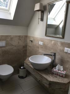 Koupelna v ubytování Ferienwohnung Hafenstrasse + 12 fotografií