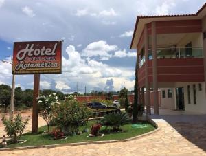 a hotel sign in front of a building at Hotel Rotamerica in Campinorte