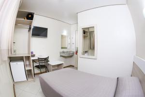 TV a/nebo společenská místnost v ubytování Hotel Express Savoy - Centro Histórico