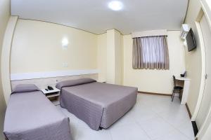 TV a/nebo společenská místnost v ubytování Hotel Express Savoy - Centro Histórico