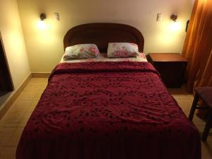 Postel nebo postele na pokoji v ubytování Hotel Mandarin