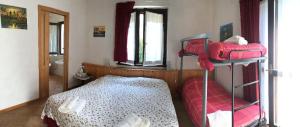 Postel nebo postele na pokoji v ubytování albergo panoramico