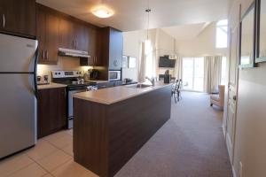 Kuchyň nebo kuchyňský kout v ubytování Condos Château-Bromont