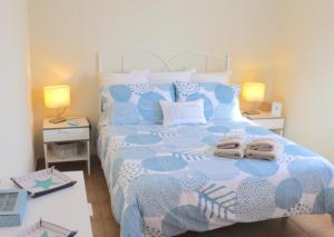 A bed or beds in a room at Villa Amistad