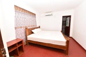 Letto o letti in una camera di Pidurangala View Home Stay