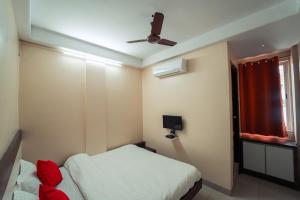 Postel nebo postele na pokoji v ubytování Hotel Aashish Deluxe Pet Friendly