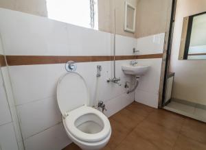 Koupelna v ubytování Hotel Aashish Deluxe Pet Friendly
