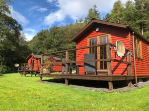 O grădină în afara Rashfield Sheilings - Unique Riverside Lodges