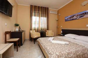 Postel nebo postele na pokoji v ubytování Hotel Play