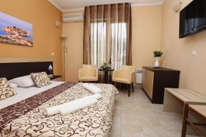 Postel nebo postele na pokoji v ubytování Hotel Play