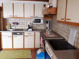 Kuchyň nebo kuchyňský kout v ubytování Ferienwohnung Öller