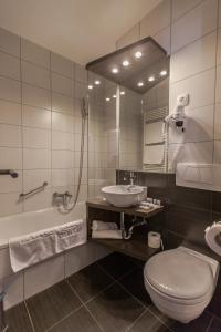 Vannituba majutusasutuses Premium Hotel Panoráma