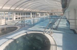 a large swimming pool on a cruise ship at Retiro Playa y Spa in Tavernes de Valldigna