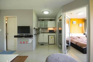 Kuchyň nebo kuchyňský kout v ubytování Grand Beach CondoB36 by malai