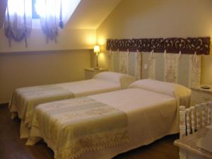 A bed or beds in a room at Albus Albi