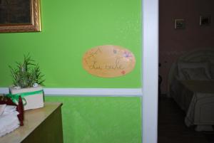 Certifikát, hodnocení, plakát nebo jiný dokument vystavený v ubytování A Casa di Mich