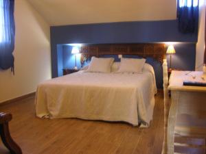 A bed or beds in a room at Albus Albi