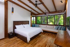 Postel nebo postele na pokoji v ubytování Spacious & Cozy Villa Melody