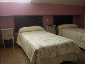 A bed or beds in a room at Albus Albi