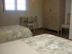 A bed or beds in a room at Albus Albi