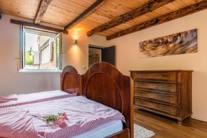 Postel nebo postele na pokoji v ubytování Tenuta Paljari