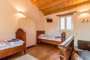 Postel nebo postele na pokoji v ubytování Tenuta Paljari